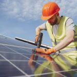 manufacturer fixing solar panels for usage